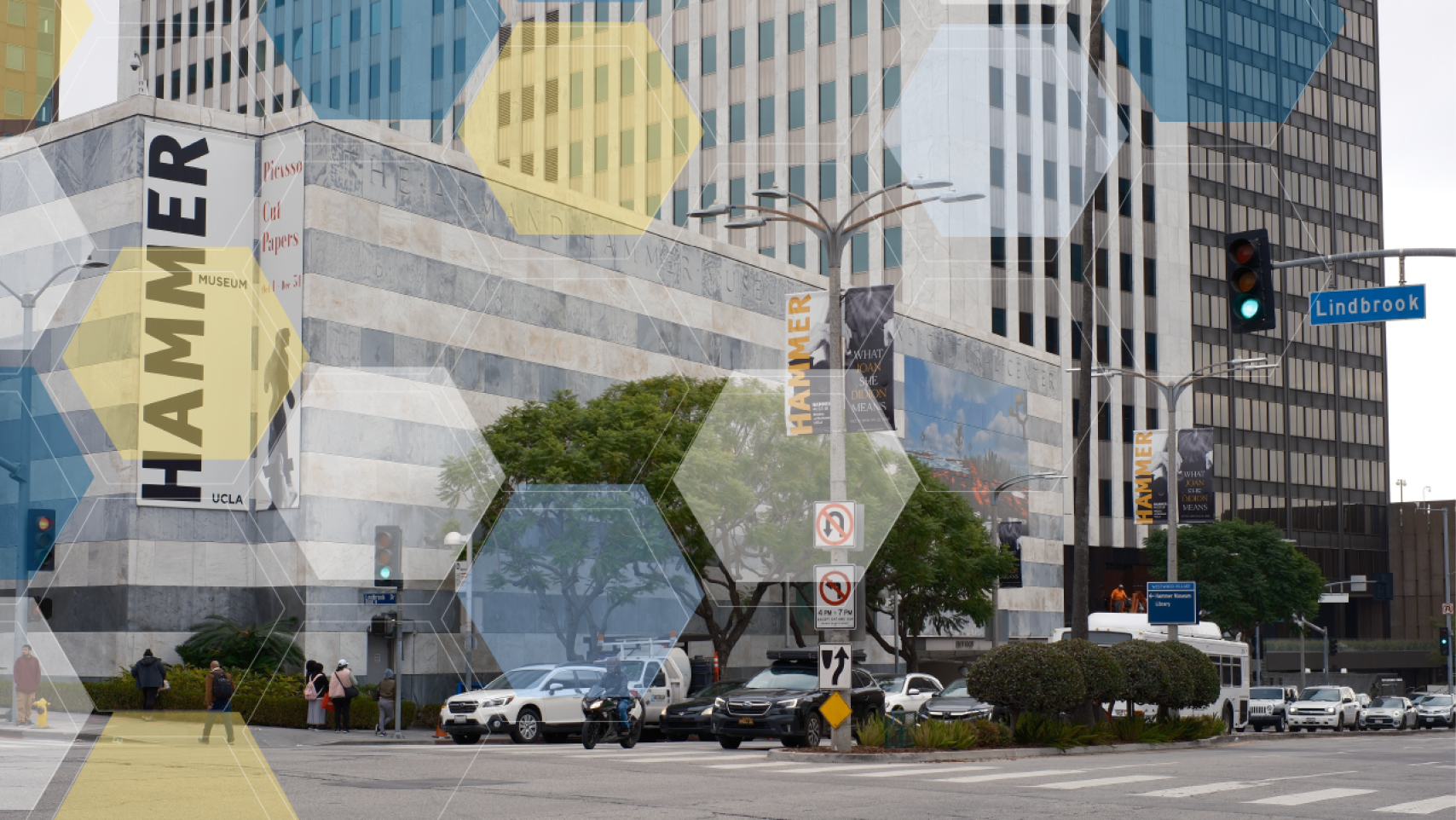 Hammer Museum with blue, white, and yellow molecule overlay